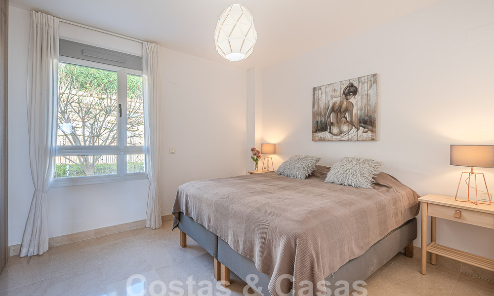 Move-in ready, elevated ground floor apartment for sale with sweeping views of the valley and sea in exclusive Benahavis - Marbella 53315
