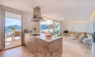 Move-in ready, elevated ground floor apartment for sale with sweeping views of the valley and sea in exclusive Benahavis - Marbella 53317 