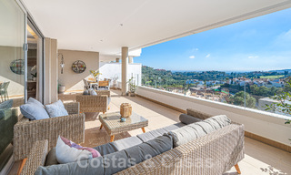 Move-in ready, elevated ground floor apartment for sale with sweeping views of the valley and sea in exclusive Benahavis - Marbella 53320 