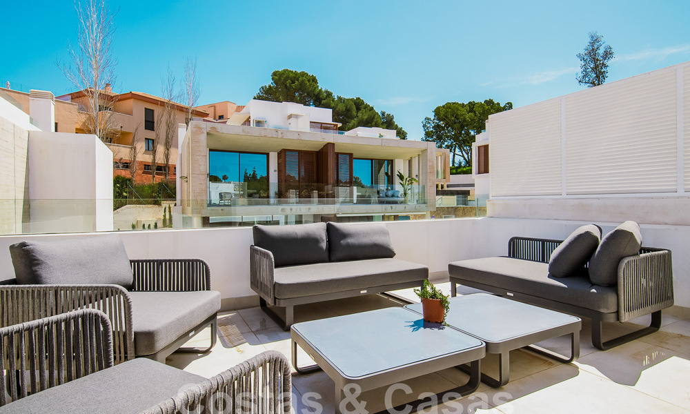 Modern semi-detached villa for sale, walking distance to Puente Romano on Marbella's Golden Mile 52729