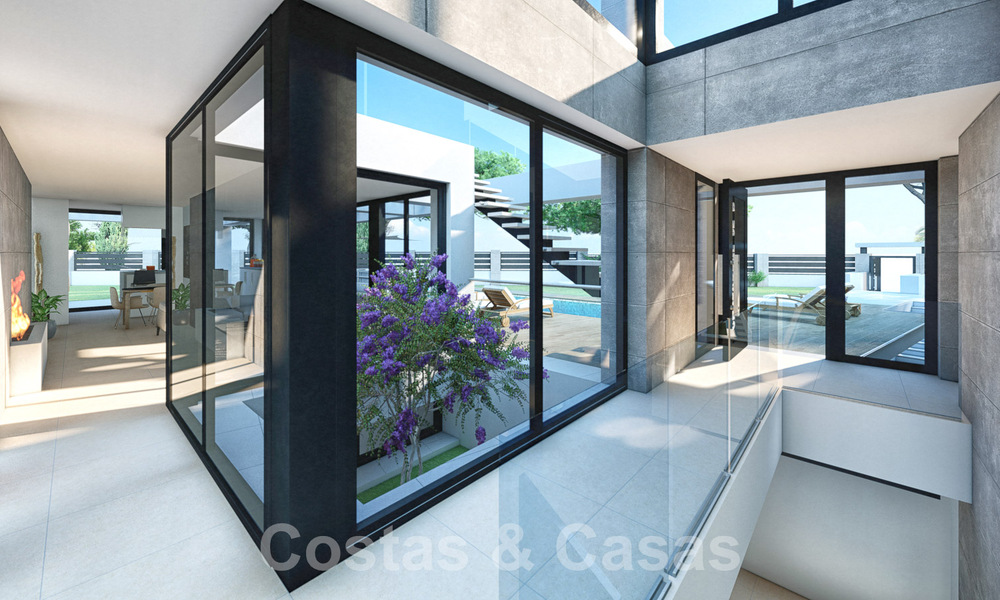 3 New designer villas for sale a stone's throw from the golf course in a luxury resort in Mijas, Costa del Sol 53568