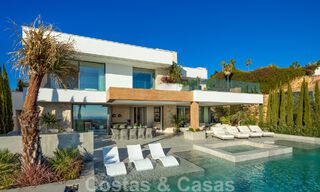 Move-in ready. Exclusive, new villa with unobstructed sea views for sale, located in a gated community in La Quinta, Marbella - Benahavis 51834 