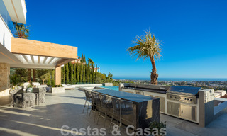 Move-in ready. Exclusive, new villa with unobstructed sea views for sale, located in a gated community in La Quinta, Marbella - Benahavis 51836 