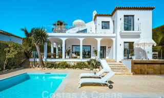 Luxurious villa for sale with a traditional architectural style located in a gated community of Nueva Andalucia, Marbella 53692 