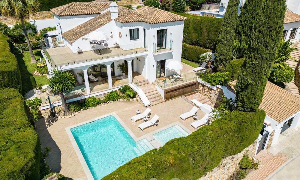 Luxurious villa for sale with a traditional architectural style located in a gated community of Nueva Andalucia, Marbella 53695