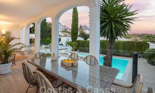 Luxurious villa for sale with a traditional architectural style located in a gated community of Nueva Andalucia, Marbella 53711 