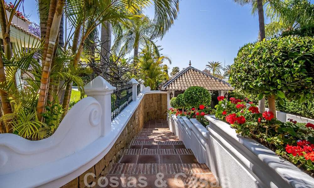 Stylish Andalusian luxury villa for sale a stone's throw from the beach in coveted urbanisation Bahia de Marbella 51877