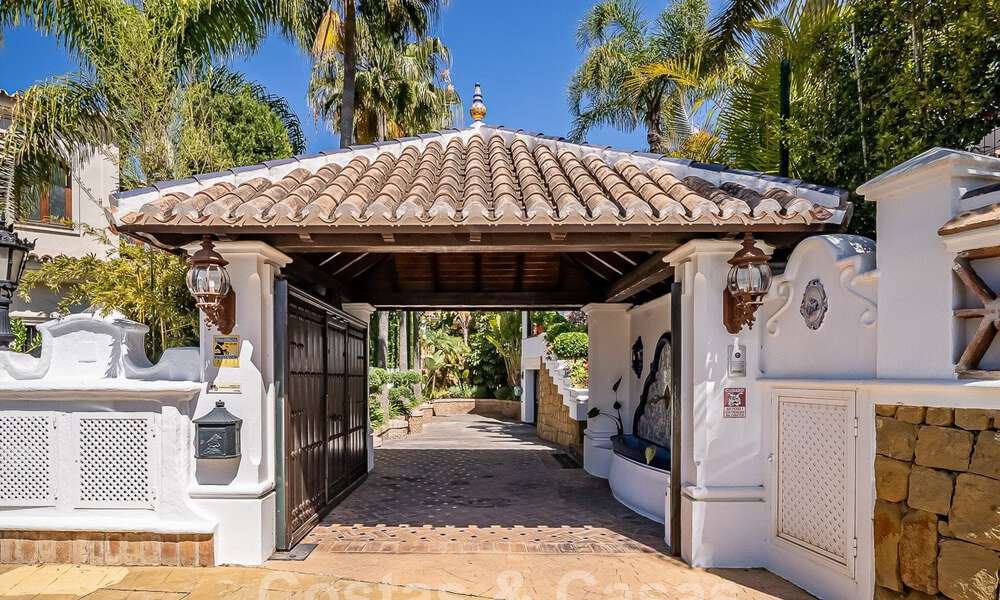 Stylish Andalusian luxury villa for sale a stone's throw from the beach in coveted urbanisation Bahia de Marbella 51879