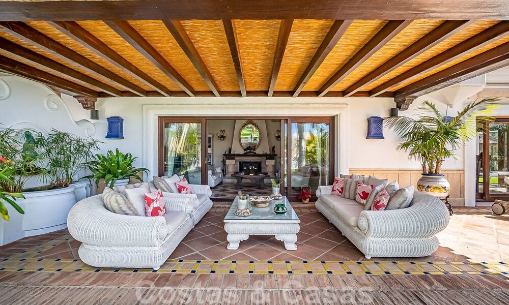 Stylish Andalusian luxury villa for sale a stone's throw from the beach in coveted urbanisation Bahia de Marbella 51880