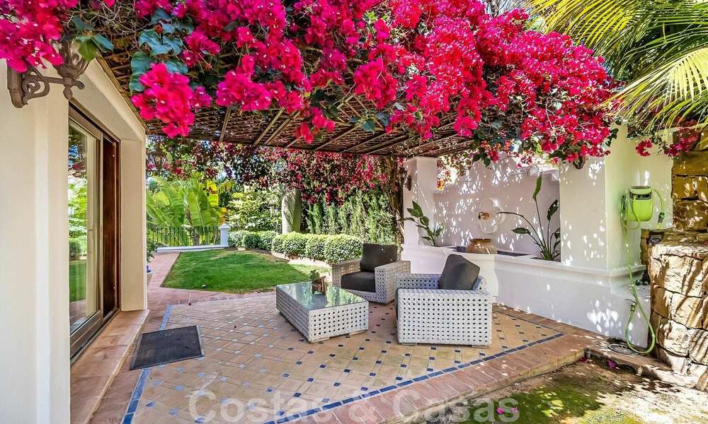 Stylish Andalusian luxury villa for sale a stone's throw from the beach in coveted urbanisation Bahia de Marbella 51888