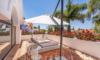 Stylish Andalusian luxury villa for sale a stone's throw from the beach in coveted urbanisation Bahia de Marbella 51893 