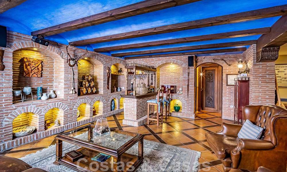 Stylish Andalusian luxury villa for sale a stone's throw from the beach in coveted urbanisation Bahia de Marbella 51898