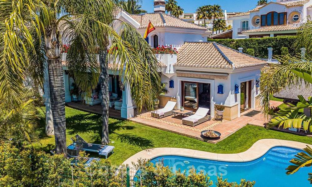 Stylish Andalusian luxury villa for sale a stone's throw from the beach in coveted urbanisation Bahia de Marbella 51909