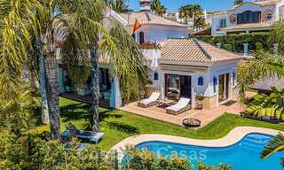 Stylish Andalusian luxury villa for sale a stone's throw from the beach in coveted urbanisation Bahia de Marbella 51909 