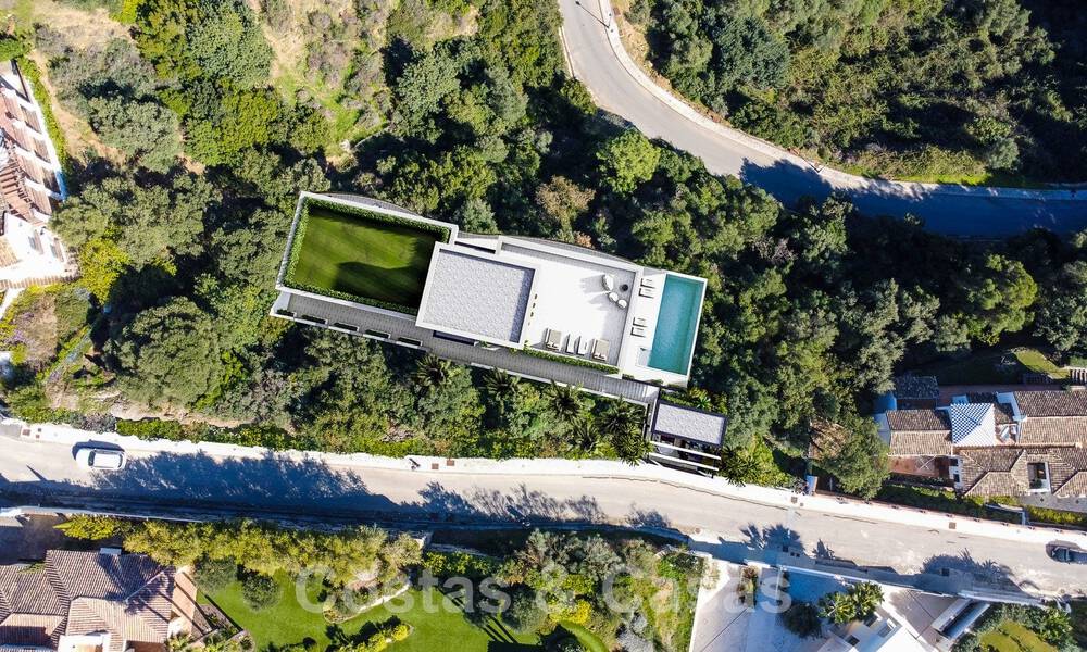 Ecological luxury villa with ultra-modern design for sale with stunning sea and mountain views in Benahavis - Marbella 52072
