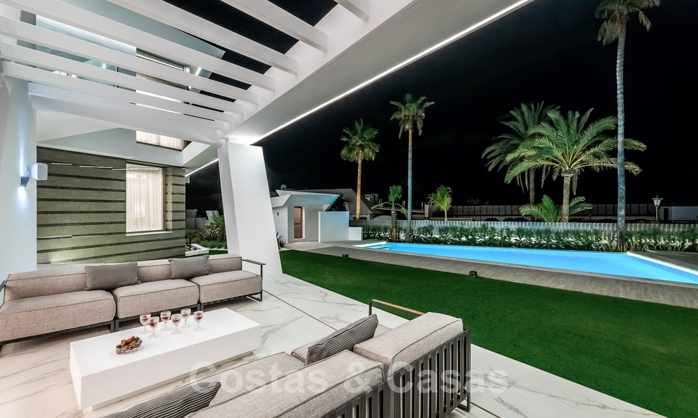 Newly built luxury villa with architectural design for sale, frontline beach in Los Monteros, Marbella 52283