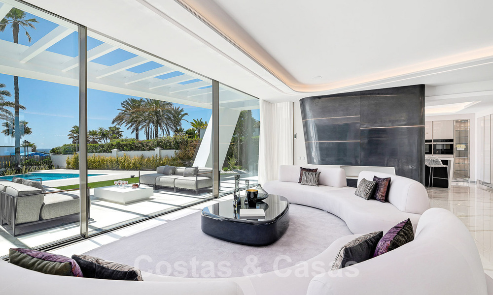 Newly built luxury villa with architectural design for sale, frontline beach in Los Monteros, Marbella 52285
