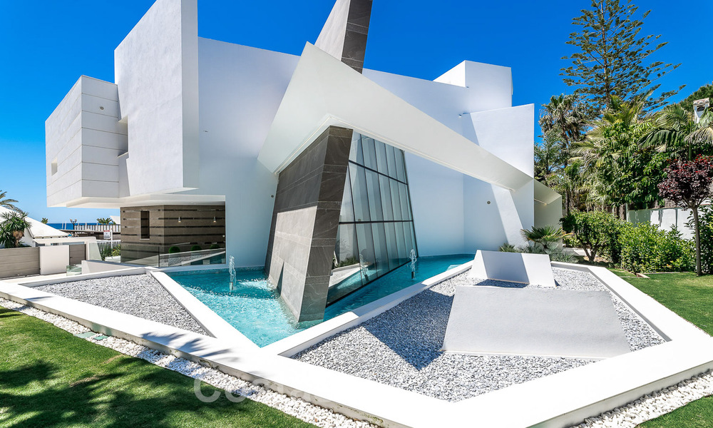 Newly built luxury villa with architectural design for sale, frontline beach in Los Monteros, Marbella 52313