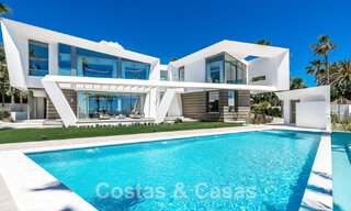 Newly built luxury villa with architectural design for sale, frontline beach in Los Monteros, Marbella 52328 