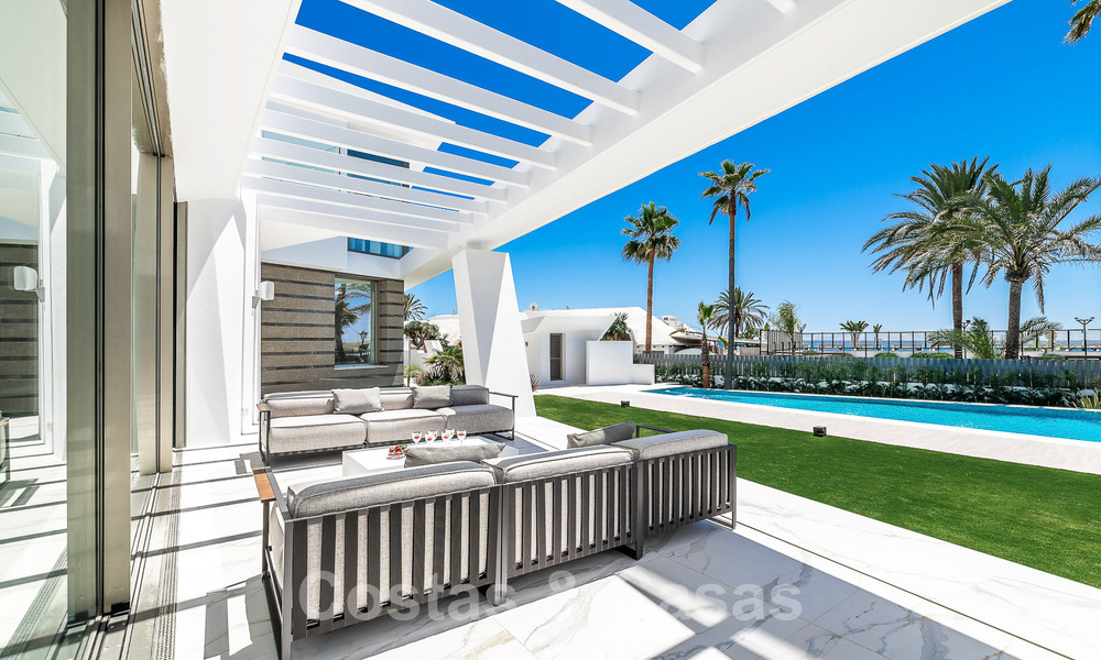 Newly built luxury villa with architectural design for sale, frontline beach in Los Monteros, Marbella 52329