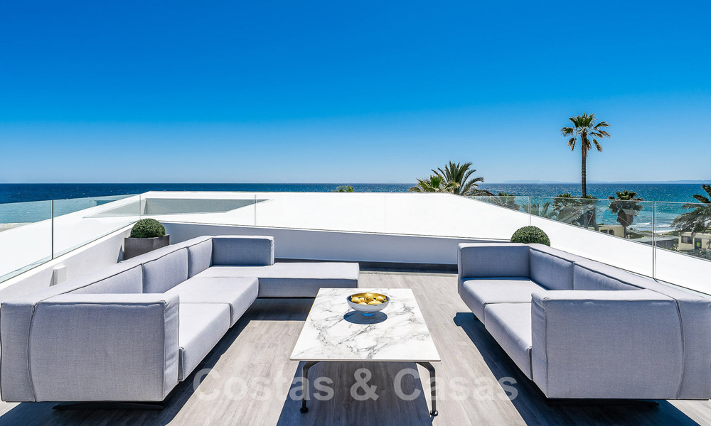 Newly built luxury villa with architectural design for sale, frontline beach in Los Monteros, Marbella 52338