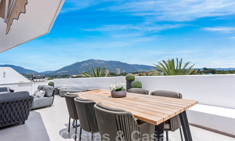 Contemporary renovated penthouse for sale with mountain and sea views in Nueva Andalucia, Marbella 53569
