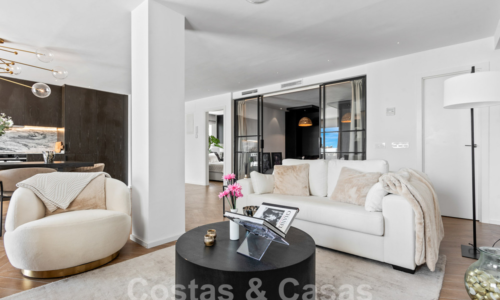 Contemporary renovated penthouse for sale with mountain and sea views in Nueva Andalucia, Marbella 53586
