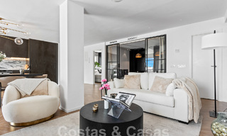 Contemporary renovated penthouse for sale with mountain and sea views in Nueva Andalucia, Marbella 53586 