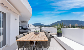 Contemporary renovated penthouse for sale with mountain and sea views in Nueva Andalucia, Marbella 53593 