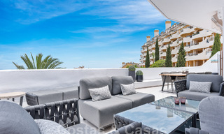 Contemporary renovated penthouse for sale with mountain and sea views in Nueva Andalucia, Marbella 53595 