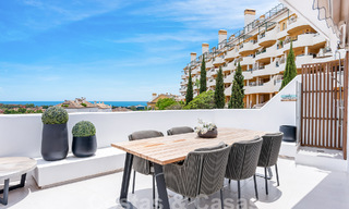 Contemporary renovated penthouse for sale with mountain and sea views in Nueva Andalucia, Marbella 53597 