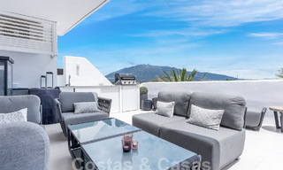 Contemporary renovated penthouse for sale with mountain and sea views in Nueva Andalucia, Marbella 53598 