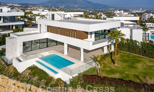 Modernist luxury villa for sale with magnificent sea and golf views in Benahavis - Marbella 54469