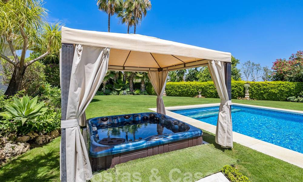 Mediterranean luxury villa for sale with 6 bedrooms in privileged golf surroundings in Nueva Andalucia's valley, Marbella 53182