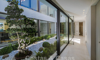 Move-in ready, new, modern 6-bedroom luxury villa for sale with sea views in La Quinta, Marbella - Benahavis 54340 