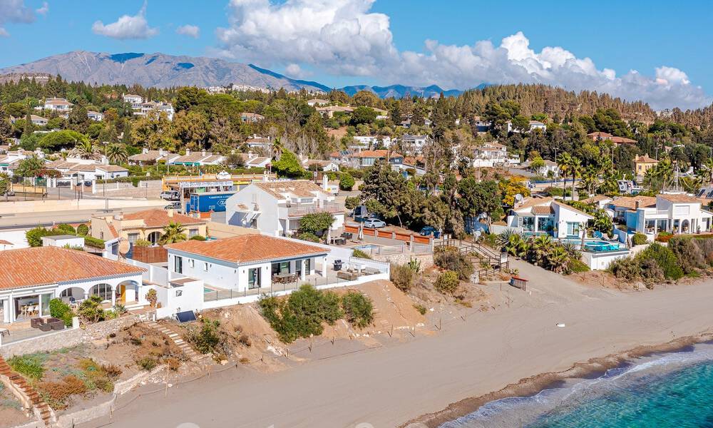 Stunning modern-Mediterranean-style beach villa for sale with frontal sea views, frontline beach in Mijas, Costa del Sol 54556