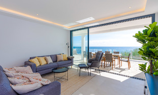 Stunning modern-Mediterranean-style beach villa for sale with frontal sea views, frontline beach in Mijas, Costa del Sol 54565 