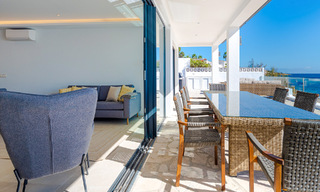 Stunning modern-Mediterranean-style beach villa for sale with frontal sea views, frontline beach in Mijas, Costa del Sol 54576 