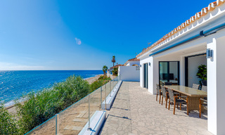 Stunning modern-Mediterranean-style beach villa for sale with frontal sea views, frontline beach in Mijas, Costa del Sol 54583 