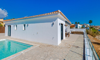 Stunning modern-Mediterranean-style beach villa for sale with frontal sea views, frontline beach in Mijas, Costa del Sol 54586 