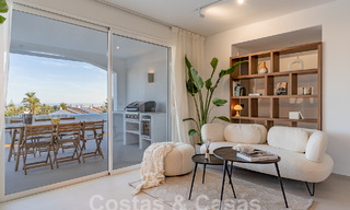 Charming luxury apartment for sale with panoramic views, walking distance to Puerto Banus in Nueva Andalucia, Marbella 54394 