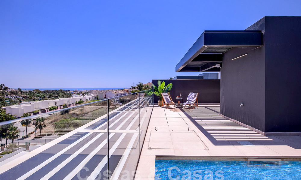 Contemporary duplex penthouse for sale with private pool, on the New Golden Mile between Marbella and Estepona 53602