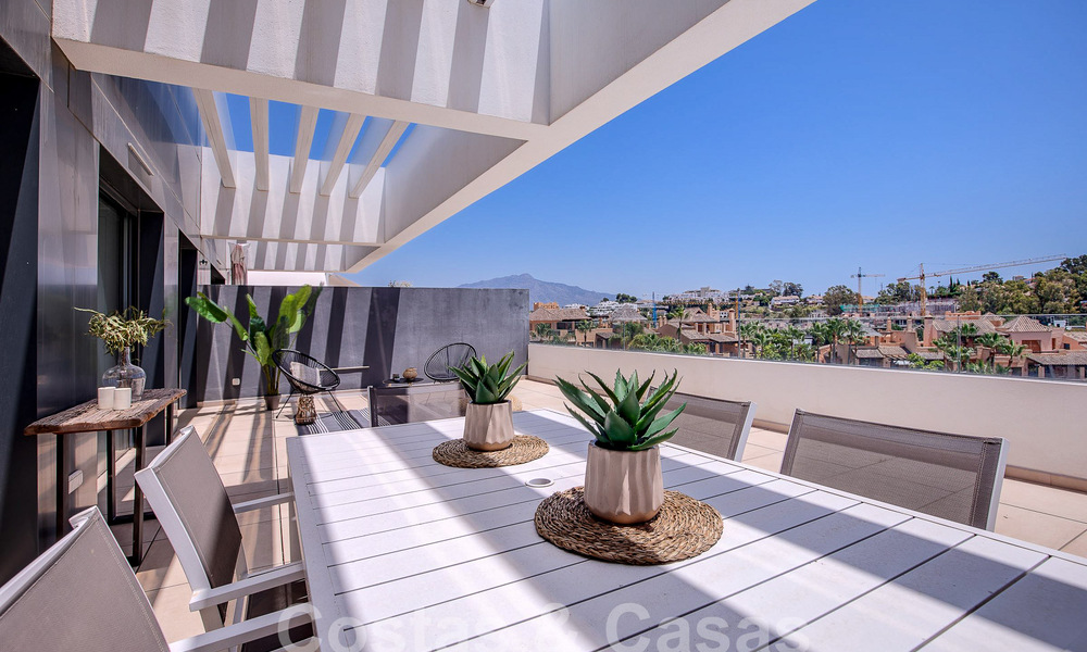 Contemporary duplex penthouse for sale with private pool, on the New Golden Mile between Marbella and Estepona 53611