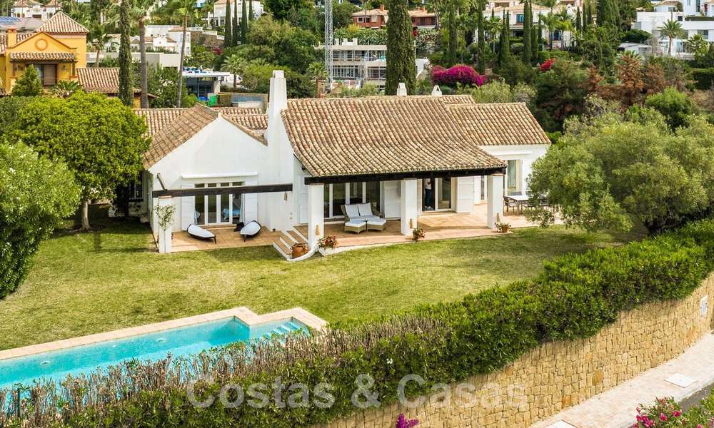 Luxury villa for sale in a Spanish architectural style in the prestigious gated urbanisation of Cascada de Camojan, Marbella 54856