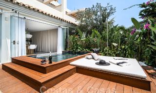 Luxurious apartment for sale with inviting terrace, private pool and sea views in Nueva Andalucia, Marbella 54949 