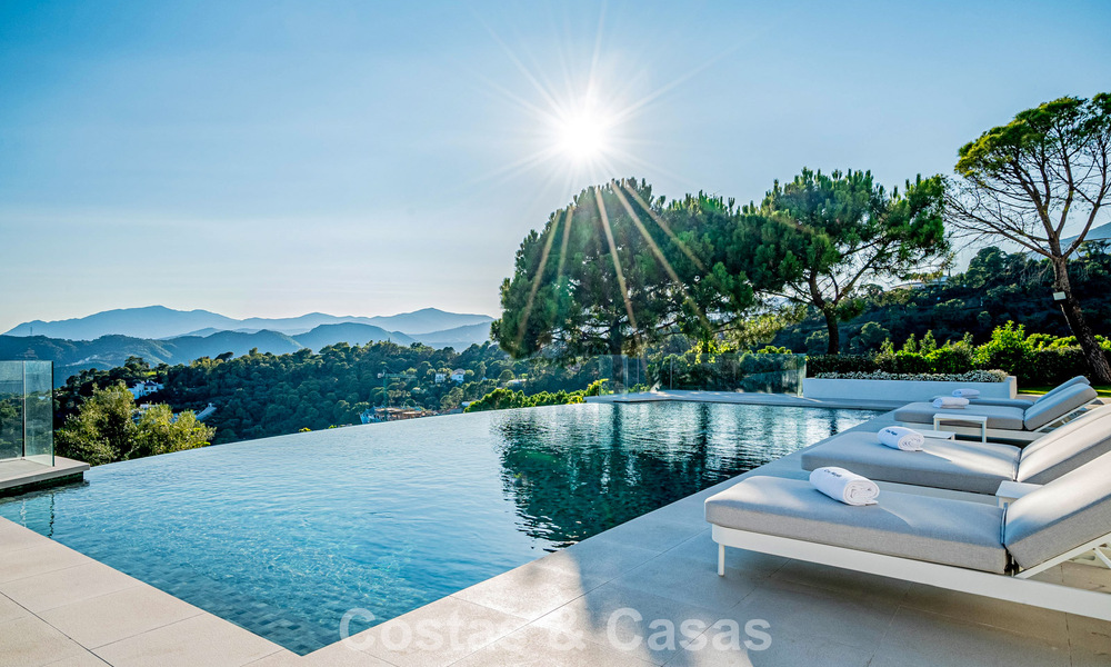 Boutique resort-style villa for sale with open sea views, nestled in the lush greenery of the exclusive La Zagaleta golf resort, Marbella - Benahavis 54083