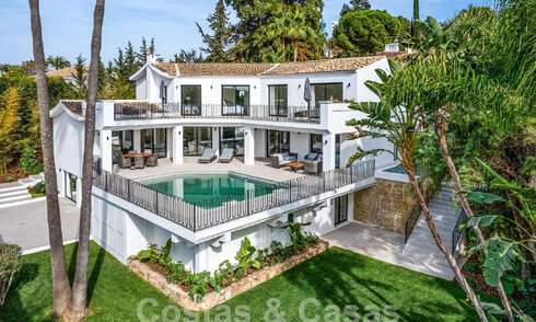 Spacious luxury villa for sale with a traditional architectural style located in a preferred residential area on the New Golden Mile, Marbella - Benahavis 55006