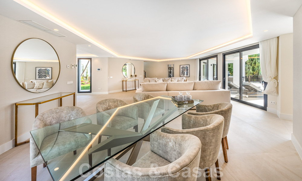Spacious luxury villa for sale with a traditional architectural style located in a preferred residential area on the New Golden Mile, Marbella - Benahavis 55008