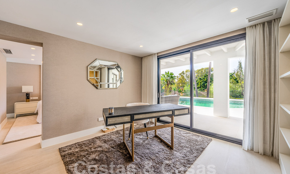 Spacious luxury villa for sale with a traditional architectural style located in a preferred residential area on the New Golden Mile, Marbella - Benahavis 55010