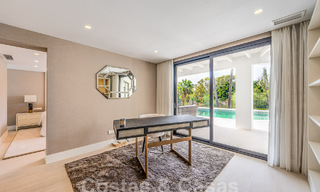 Spacious luxury villa for sale with a traditional architectural style located in a preferred residential area on the New Golden Mile, Marbella - Benahavis 55010 